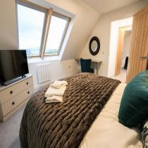 Bedroom beneath rooflights in the Broadford LH702PD